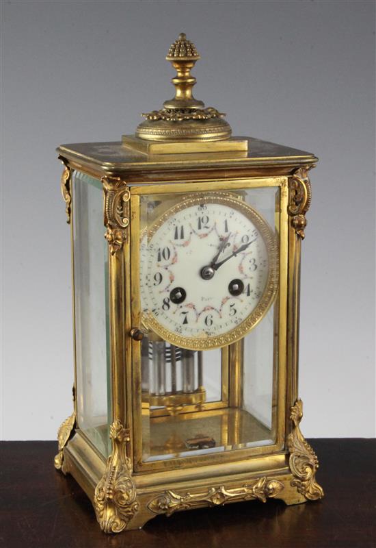 An early 20th century French ormolu four glass mantel clock, height 10in.